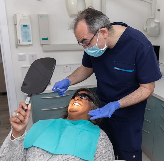 Dr Glafcos Tombolis treating a patient at Ethicare Dental